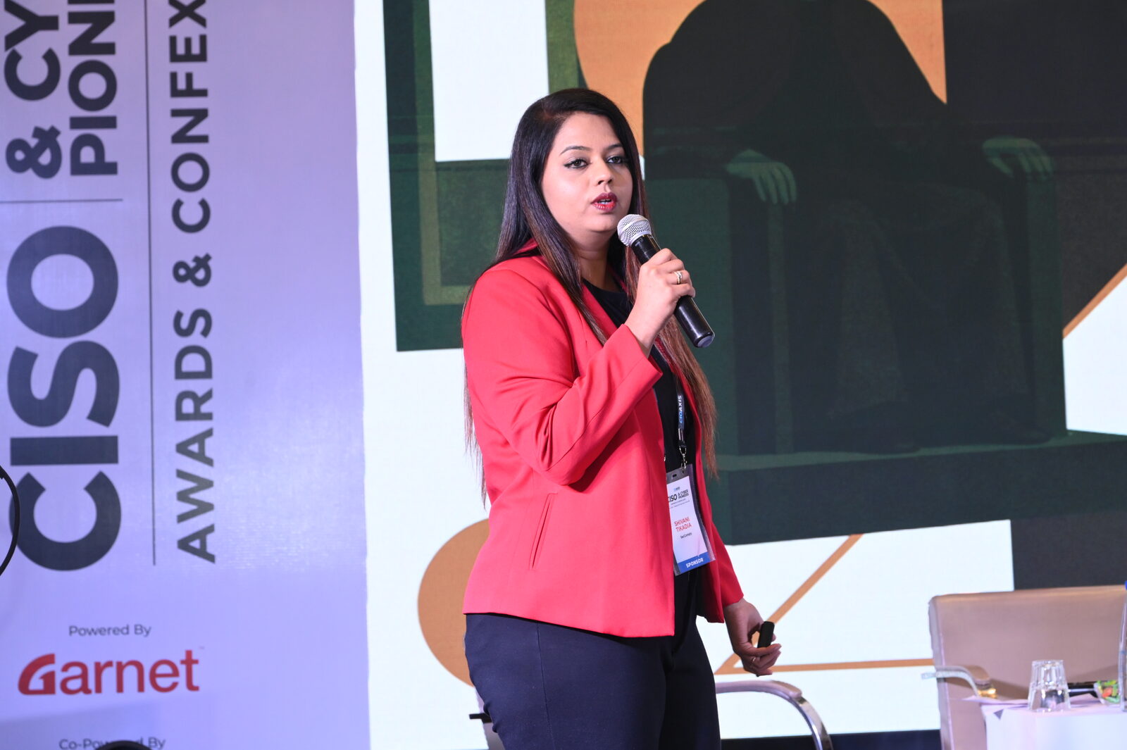 Shivani Tikadia delivering the keynote at CISO & Cyber Pioneers 2026, Radisson Blu Plaza, Delhi